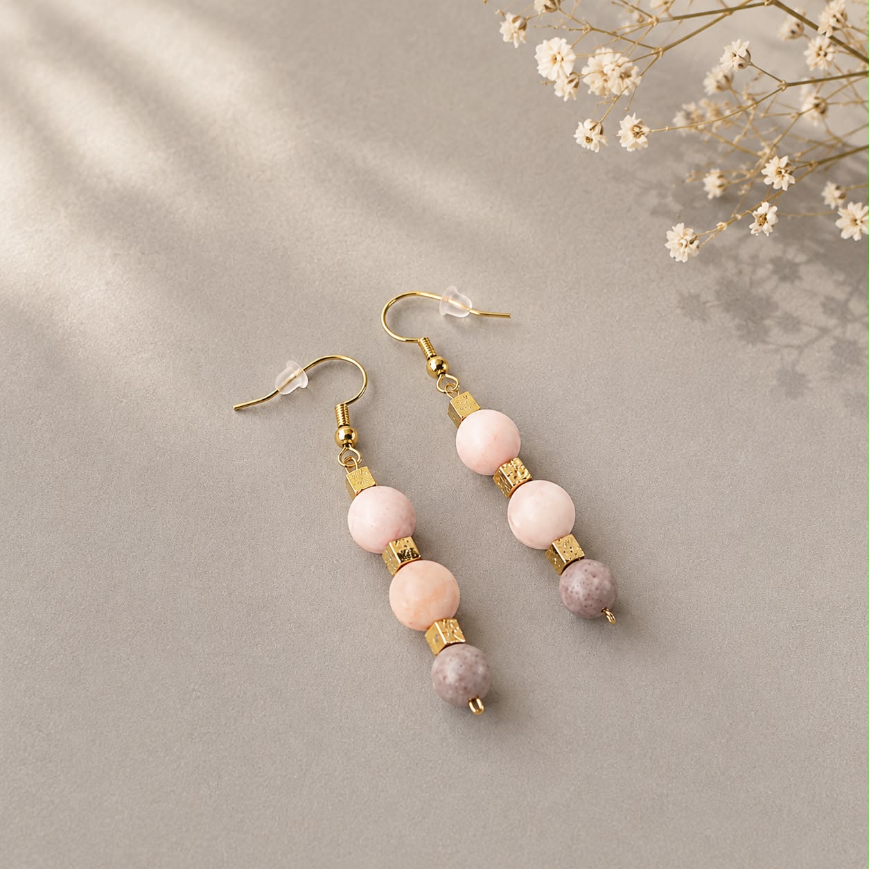 Soft blush tones with a touch of gold.